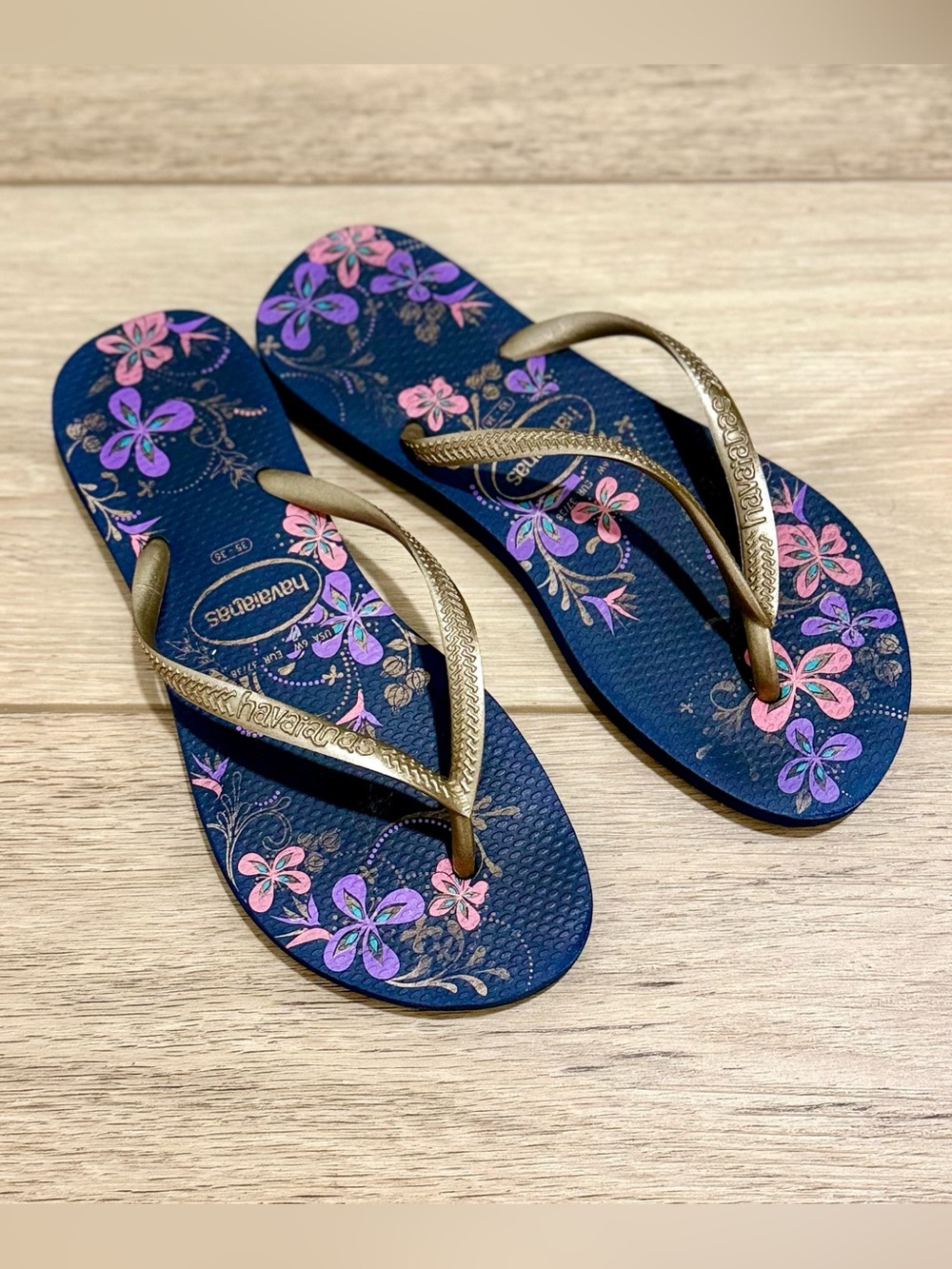 Havaianas Navy Flip Flops with Pink and Purple Floral Print and Gold Straps
